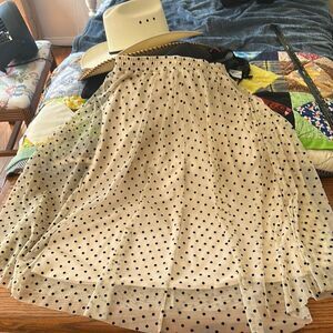 Tan and black polkadot miniskirt